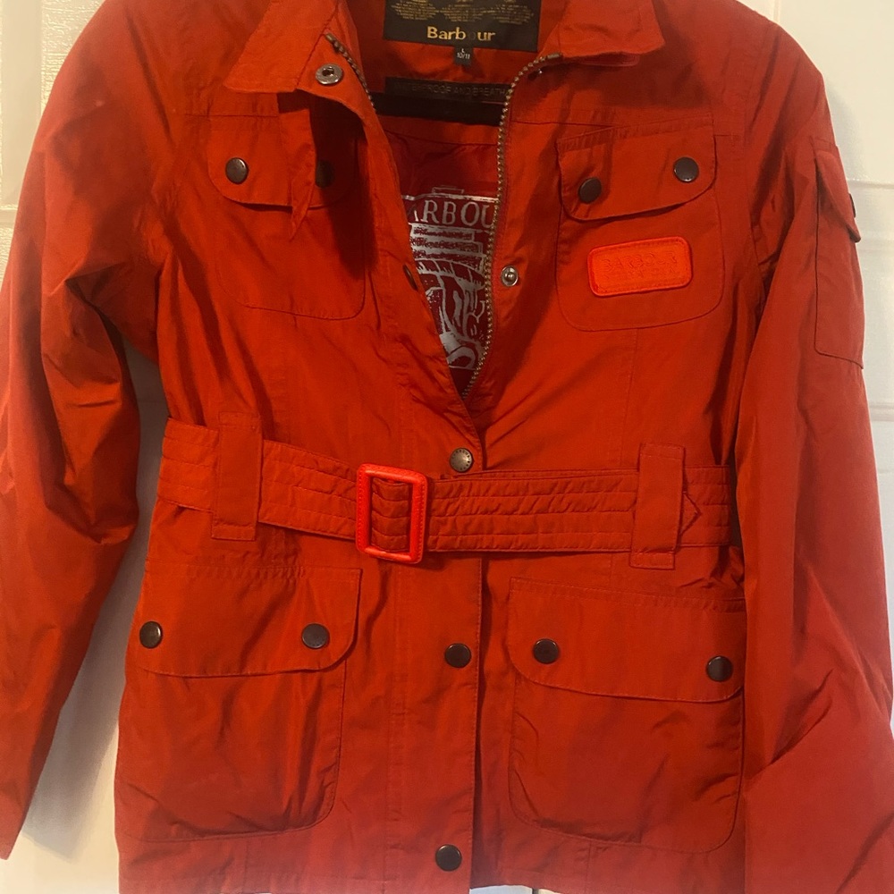 Red Barbour rain jacket